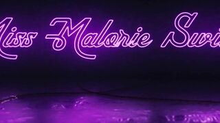miss malorie switch through green colored glasses